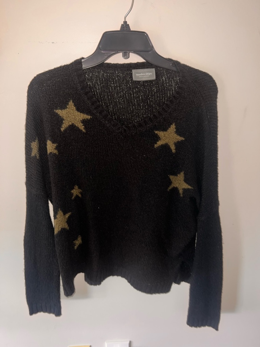 Wooden Ships Black V-Neck Sweater with Gold Star Motif